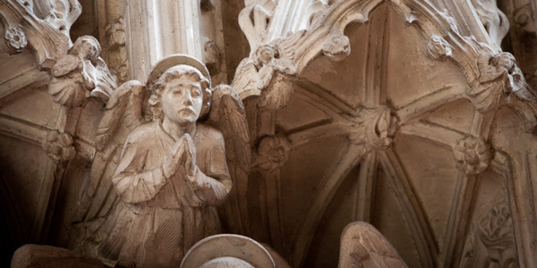 Stone angel, carved by Nathaniel Hitch, part of the reredos at All Saints Hove